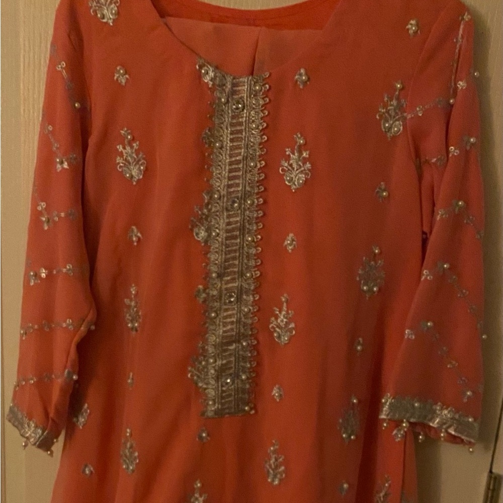 Pakistani Embellished Coral Dress with Silver Embroidery and Pearls.
